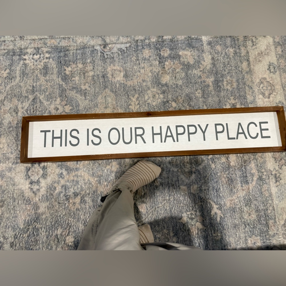 Wooden Sign with Black Text